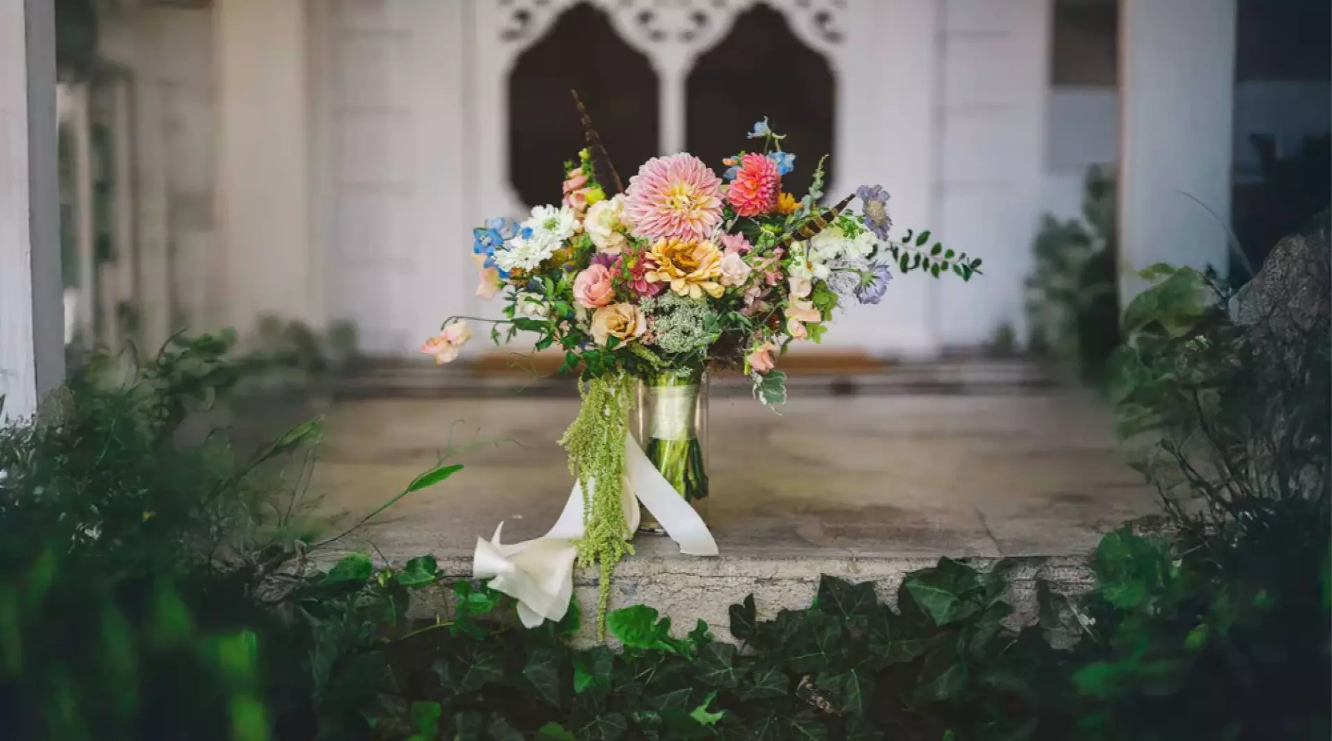Lush floral arrangement showcasing unique filler flowers for texture without baby's breath